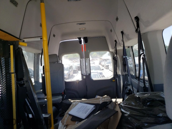 2016 Ford Transit Passenger XL with VIN 1FBZX2XM5GKB38949, listed as a Copart auction lot 54437285 with 84,653 mi miles and Clean Title. Bid and sale history available at DreamBid. Image 10.