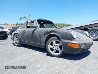 1988 Porsche 911 z VIN WP0EB0917JS161351, wystawiony jako IAAI lot #39908257 z przebiegiem Nie podano mil oraz . Historia ofert i sprzedaży dostępna na DreamBid. Obrazek 1.