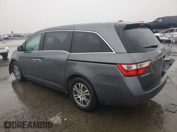 2011 Honda Odyssey EX-L with VIN 5FNRL5H64BB050425, listed as a Copart auction lot 49101795 with 192,238 mi miles and Salvage Title. Bid and sale history available at DreamBid. Image 2.