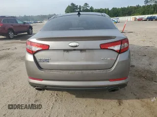 2013 Kia Optima SX с VIN 5XXGR4A6XDG248081, выставлен на аукционе Copart как лот 55997735 с пробегом 122 088 миль миль и Списание • Salvage title. История ставок и продаж доступна на DreamBid. Изображение 6.