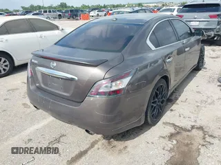 2014 Nissan Maxima SV with VIN 1N4AA5AP2EC447824, listed as a IAAI auction lot 42481206 with 157,540 mi miles and . Bid and sale history available at DreamBid. Image 4.