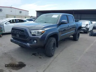 2019 Toyota Tacoma SR with VIN 3TMCZ5AN3KM207783, listed as a IAAI auction lot 42375280 with 55,784 mi miles and . Bid and sale history available at DreamBid. Image 18.