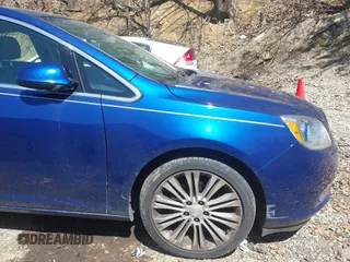 2014 Buick Verano with VIN 1G4PP5SK9E4135804, listed as a IAAI auction lot 42121881 with 106,800 mi miles. Bid and sale history available at carsss.com. Image 14.
