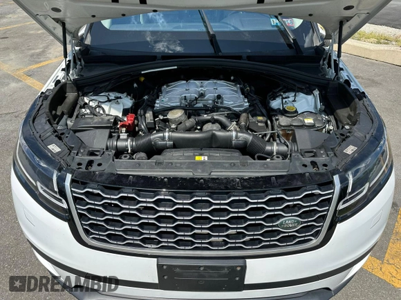 2018 Land Rover Range Rover Velar S z VIN SALYB2RV3JA746101, wystawiony jako Copart lot #64204745 z przebiegiem 69 220 mil mil oraz Czysty tytuł • Clean title. Historia ofert i sprzedaży dostępna na DreamBid. Obrazek 9.