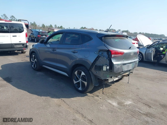 2017 Hyundai Tucson Value with VIN KM8J33A24HU281183, listed as a IAAI auction lot 41563886 with 71,110 mi miles. Bid and sale history available at carsss.com. Image 3.