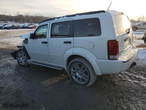 2007 Dodge Nitro R/T with VIN 1D8GU58637W630029, listed as a Copart auction lot 86052494 with 211,515 mi miles and Salvage Title. Bid and sale history available at carsss.com. Image 2.