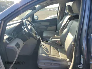 2014 Honda Odyssey Touring with VIN 5FNRL5H94EB116891, listed as a Copart auction lot 61400725 with 202,972 mi miles and Salvage title. Bid and sale history available at DreamBid. Image 7.