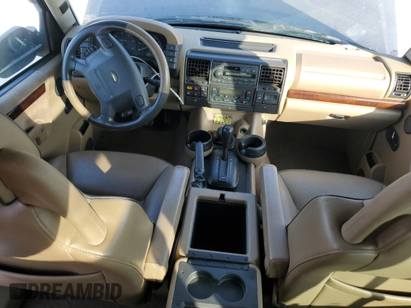 2001 Land Rover Discovery z VIN SALTW12451A708797, wystawiony jako Copart lot #43953955 z przebiegiem 125 768 mil mil oraz Czysty tytuł • Clean title. Historia ofert i sprzedaży dostępna na DreamBid. Obrazek 8.