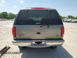 1999 Ford Expedition XLT z VIN 1FMPU18L0XLC03675, wystawiony jako Copart lot #56721435 z przebiegiem 111 652 mil mil oraz Szkoda całkowita • Salvage title. Historia ofert i sprzedaży dostępna na DreamBid. Obrazek 6.