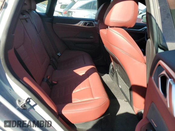 2022 BMW i4 eDrive40 z VIN WBY73AW0XNFN24679, wystawiony jako Copart lot #70213313 z przebiegiem 14 403 mil mil oraz . Historia ofert i sprzedaży dostępna na DreamBid. Obrazek 10.