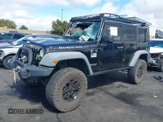 2014 Jeep Wrangler Unlimited Rubicon with VIN 1C4BJWFGXEL172622, listed as a IAAI auction lot 41782796 with 67,594 mi miles. Bid and sale history available at carsss.com. Image 19.