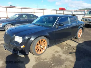 2006 Chrysler 300 C SRT8 with VIN 2C3LA73W06H370568, listed as a IAAI auction lot 41982346 with 133,209 mi miles. Bid and sale history available at carsss.com. Image 17.