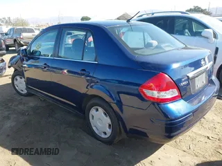 2009 Nissan Versa 1.8 S with VIN 3N1BC11E29L360857, listed as a IAAI auction lot 40629379 with 114,499 mi miles. Bid and sale history available at carsss.com. Image 3.