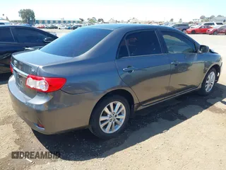 2011 Toyota Corolla L with VIN 2T1BU4EE7BC738640, listed as a IAAI auction lot 42024474 with 164,322 mi miles. Bid and sale history available at carsss.com. Image 4.