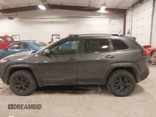 2015 Jeep Cherokee Trailhawk с VIN 1C4PJMBSXFW525218, выставлен на аукционе IAAI как лот 42032130 с пробегом 164 289 миль миль и . История ставок и продаж доступна на DreamBid. Изображение 14.
