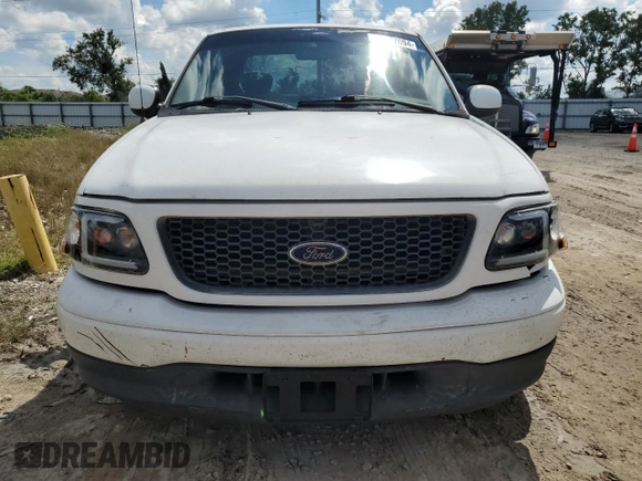 2001 Ford F-150 XL with VIN 1FTRX07L81KF40897, listed as a Copart auction lot 73887094 with 0 mi miles and Salvage Title. Bid and sale history available at carsss.com. Image 5.