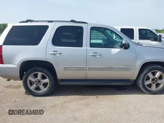2011 Chevrolet Tahoe LS with VIN 1GNSCAE0XBR111949, listed as a IAAI auction lot 42630787 with 220,857 mi miles and . Bid and sale history available at DreamBid. Image 13.