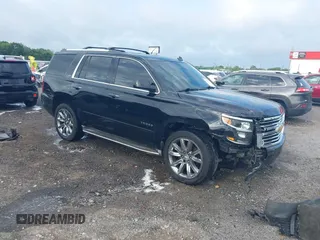 2015 Chevrolet Tahoe LTZ with VIN 1GNSKCKC2FR257796, listed as a IAAI auction lot 42257499 with 229,505 mi miles and . Bid and sale history available at DreamBid. Image 1.