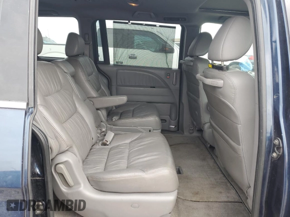 2009 Honda Odyssey EX-L with VIN 5FNRL38629B409446, listed as a Copart auction lot 54736045 with 176,229 mi miles and Salvage Title. Bid and sale history available at DreamBid. Image 11.