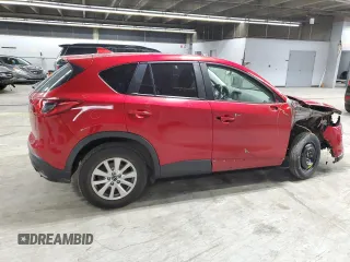 2016 Mazda CX-5 Touring z VIN JM3KE4CY6G0647362, wystawiony jako Copart lot #58081855 z przebiegiem 86 372 mil mil oraz Szkoda całkowita • Salvage title. Historia ofert i sprzedaży dostępna na DreamBid. Obrazek 3.