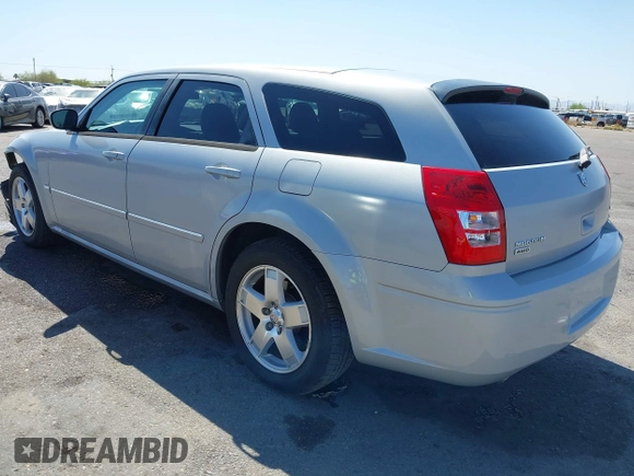 2005 Dodge Magnum z VIN 2D8GZ58235H576127, wystawiony jako IAAI lot #41989680 z przebiegiem 136 488 mil mil oraz . Historia ofert i sprzedaży dostępna na DreamBid. Obrazek 3.