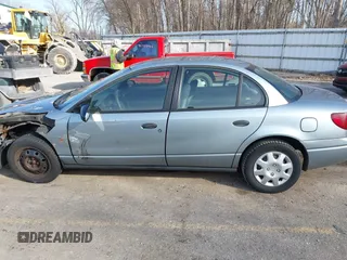 2002 Saturn SL z VIN 1G8ZH52892Z151119, wystawiony jako IAAI lot #41764757 z przebiegiem 82 017 mil mil oraz . Historia ofert i sprzedaży dostępna na DreamBid. Obrazek 14.