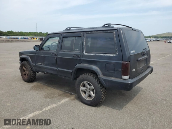 1999 Jeep Cherokee Sport with VIN 1J4FF68S9XL635836, listed as a Copart auction lot 59573195 with 187,035 mi miles and Salvage title. Bid and sale history available at DreamBid. Image 2.