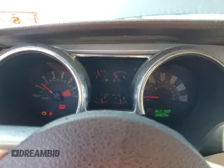 2005 Ford Mustang Deluxe с VIN 1ZVFT84N155227663, выставлен на аукционе Copart как лот 57402915 с пробегом 184 817 миль миль и Списание • Salvage title. История ставок и продаж доступна на DreamBid. Изображение 9.
