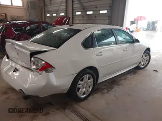 2013 Chevrolet Impala LT with VIN 2G1WB5E31D1164929, listed as a IAAI auction lot 42091934 with 67,218 mi miles and . Bid and sale history available at DreamBid. Image 4.