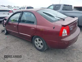 2002 Kia Spectra GS z VIN KNAFB161925092898, wystawiony jako IAAI lot #41753073 z przebiegiem 120 054 mil mil oraz . Historia ofert i sprzedaży dostępna na DreamBid. Obrazek 3.