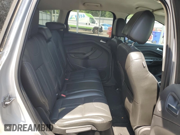 2013 Ford Escape Titanium z VIN 1FMCU0J96DUB50607, wystawiony jako Copart lot #55999745 z przebiegiem 177 798 mil mil oraz Czysty tytuł • Clean title. Historia ofert i sprzedaży dostępna na DreamBid. Obrazek 11.