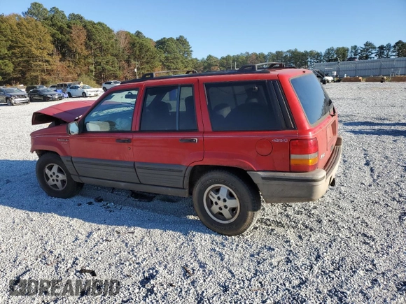 1995 Jeep Grand Cherokee Laredo with VIN 1J4GZ58S7SC747906, listed as a Copart auction lot 82529374 with 73,932 mi miles and Salvage Title. Bid and sale history available at carsss.com. Image 2.