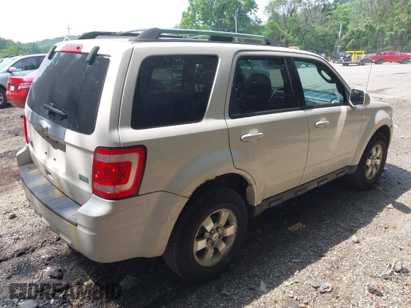 2010 Ford Escape Limited with VIN 1FMCU9EG8AKC42841, listed as a IAAI auction lot 42492355 with 159,939 mi miles and . Bid and sale history available at DreamBid. Image 4.