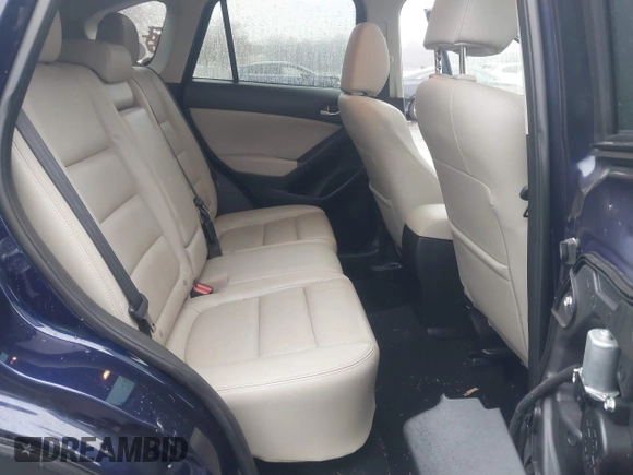 2014 Mazda CX-5 Grand Touring with VIN JM3KE4DY8E0366644, listed as a IAAI auction lot 41971438 with 135,644 mi miles and . Bid and sale history available at carsss.com. Image 8.