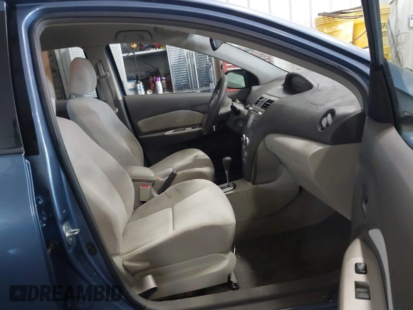 2009 Toyota Yaris z VIN JTDBT903291334617, wystawiony jako IAAI lot #40966291 z przebiegiem 203 578 mil mil oraz . Historia ofert i sprzedaży dostępna na DreamBid. Obrazek 5.
