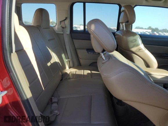 2012 Jeep Patriot Limited with VIN 1C4NJPCB4CD526444, listed as a Copart auction lot 82899834 with 127,220 mi miles and Salvage title. Bid and sale history available at DreamBid. Image 11.