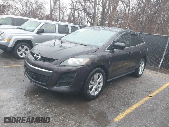 2010 Mazda CX-7 Grand Touring z VIN JM3ER4W32A0338657, wystawiony jako IAAI lot #41207462 z przebiegiem 257 713 mil mil oraz . Historia ofert i sprzedaży dostępna na DreamBid. Obrazek 2.