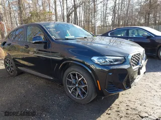 2024 BMW X4 xDrive30i with VIN 5UX33DT03R9U29504, listed as a IAAI auction lot 41460793 with 19,392 mi miles. Bid and sale history available at carsss.com. Image 1.