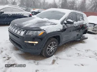 2020 Jeep Compass Latitude with VIN 3C4NJDBB8LT231115, listed as a IAAI auction lot 41254345 with 95,721 mi miles. Bid and sale history available at carsss.com. Image 2.