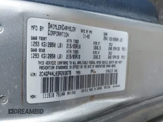 2003 Chrysler Town & Country LX with VIN 2C4GP44L03R203678, listed as a IAAI auction lot 41293296 with 210,827 mi miles and . Bid and sale history available at DreamBid. Image 9.