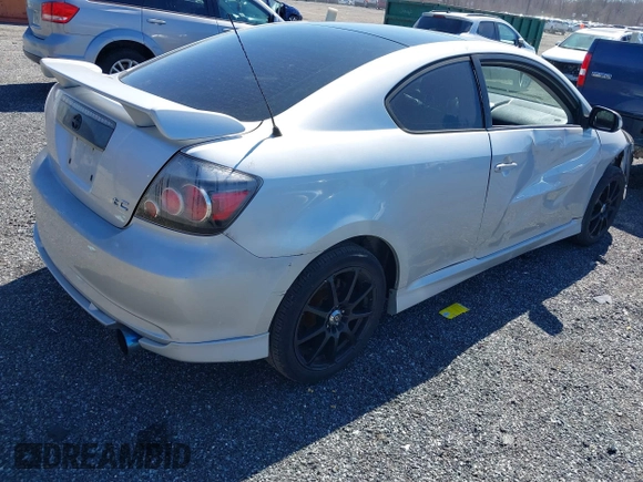 2005 Scion tC with VIN JTKDE177250058672, listed as a IAAI auction lot 41897545 with 194,989 mi miles. Bid and sale history available at carsss.com. Image 4.