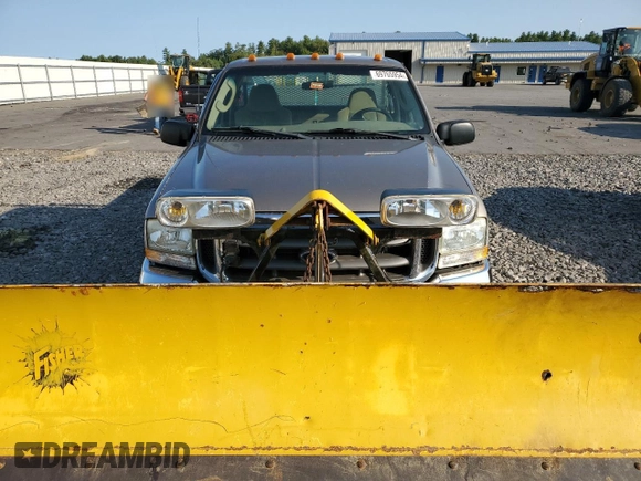 2003 Ford F-250 with VIN 3FTNF21LX3MB28837, listed as a Copart auction lot 69765954 with 97,406 mi miles and Salvage title. Bid and sale history available at DreamBid. Image 5.
