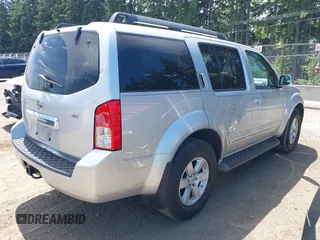 2010 Nissan Pathfinder LE with VIN 5N1AR1NB3AC606320, listed as a IAAI auction lot 42477889 with 67,686 mi miles and . Bid and sale history available at DreamBid. Image 4.