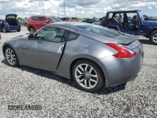 2014 Nissan 370Z with VIN JN1AZ4EH6EM633797, listed as a Copart auction lot 74027354 with Not Provided miles and Salvage Title. Bid and sale history available at DreamBid. Image 2.