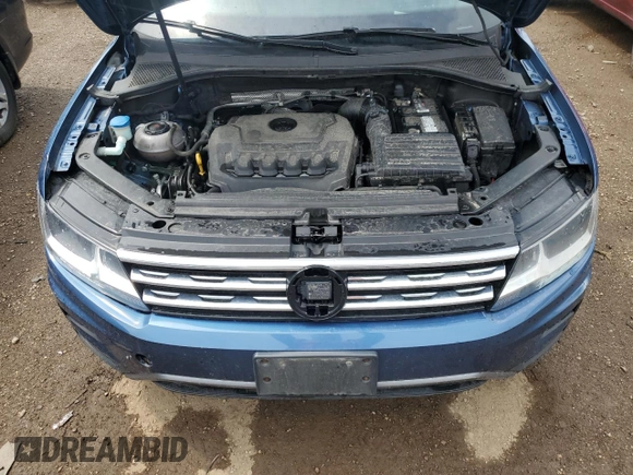 2018 Volkswagen Tiguan SEL z VIN 3VV2B7AX4JM076635, wystawiony jako Copart lot #54713815 z przebiegiem 162 692 mil mil oraz Szkoda całkowita • Salvage title. Historia ofert i sprzedaży dostępna na DreamBid. Obrazek 11.