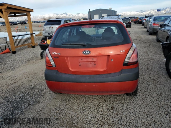 2009 Kia Rio LX with VIN KNADE243X96587429, listed as a Copart auction lot 46500825 with 116,557 mi miles and Salvage Title. Bid and sale history available at carsss.com. Image 6.