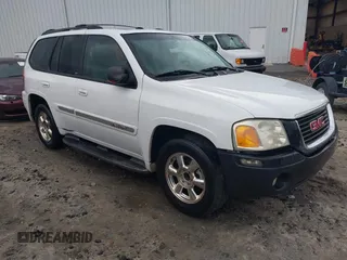 2002 GMC Envoy SLT with VIN 1GKDS13S922501849, listed as a IAAI auction lot 41712115 with 223,426 mi miles. Bid and sale history available at carsss.com. Image 1.