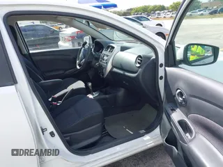2016 Nissan Versa S Plus with VIN 3N1CN7AP9GL831693, listed as a IAAI auction lot 41530243 with 104,323 mi miles. Bid and sale history available at carsss.com. Image 5.
