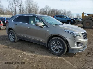 2022 Cadillac XT5 AWD Premium Luxury with VIN 1GYKNDRSXNZ121976, listed as a Copart auction lot 47200175 with 21,627 mi miles and Clean title. Bid and sale history available at DreamBid. Image 4.