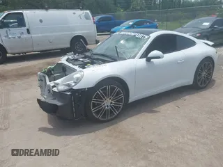 2015 Porsche 911 Carrera z VIN WP0AA2A90FS100123, wystawiony jako IAAI lot #42339229 z przebiegiem 135 198 mil mil oraz . Historia ofert i sprzedaży dostępna na DreamBid. Obrazek 2.